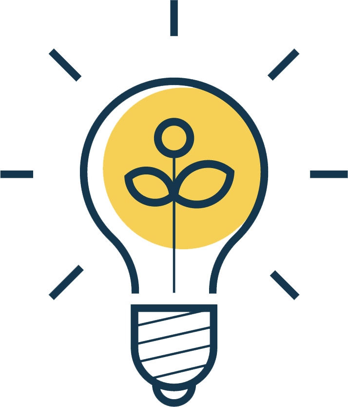 A light bulb with a plant inside it.