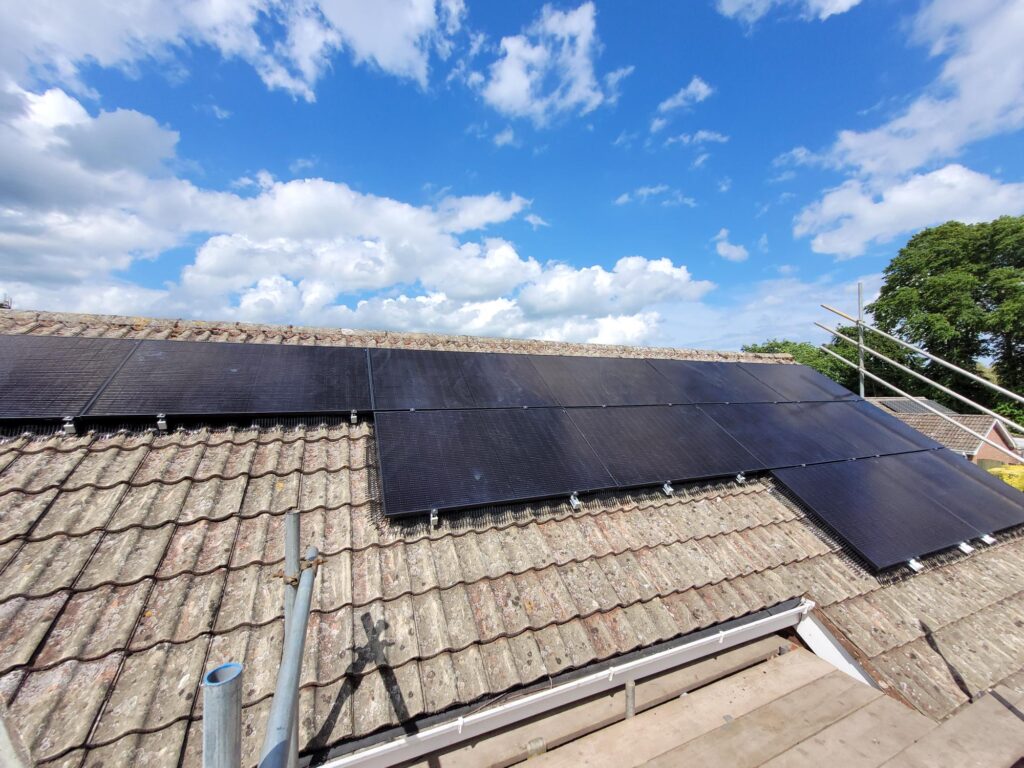 a roof with several solar panels on it.