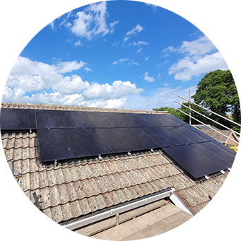 a round picture of a roof with a solar panel on it.