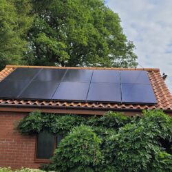 a house with a solar panel on the roof.