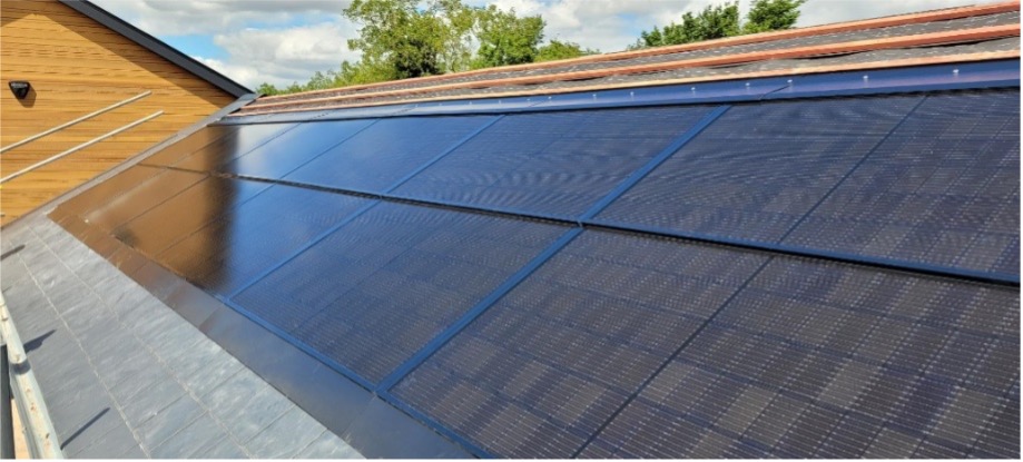 the roof of a house with a solar panel on it.