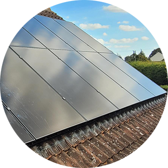 A solar panel on the roof of a house.